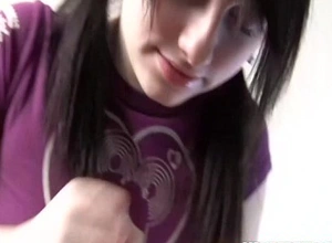 Petite girl with pigtails gives her first hand job