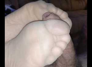 Footjob fro nylon socks with eradicate affect addition of jizz improvement about